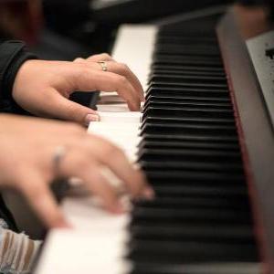AACC student practices piano.