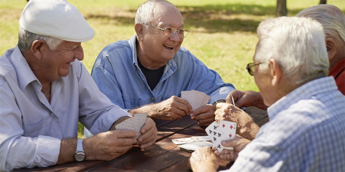 Group of Seniors playing cards